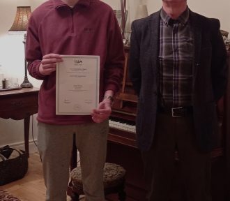 Eoghan Durkan achieves a distinction in his senior piano exam